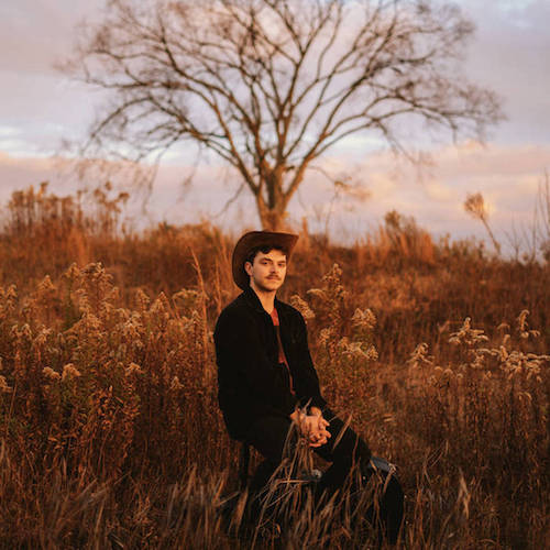 Album cover for In Lieu of Youth, Lilac War sitting in a tall brush field